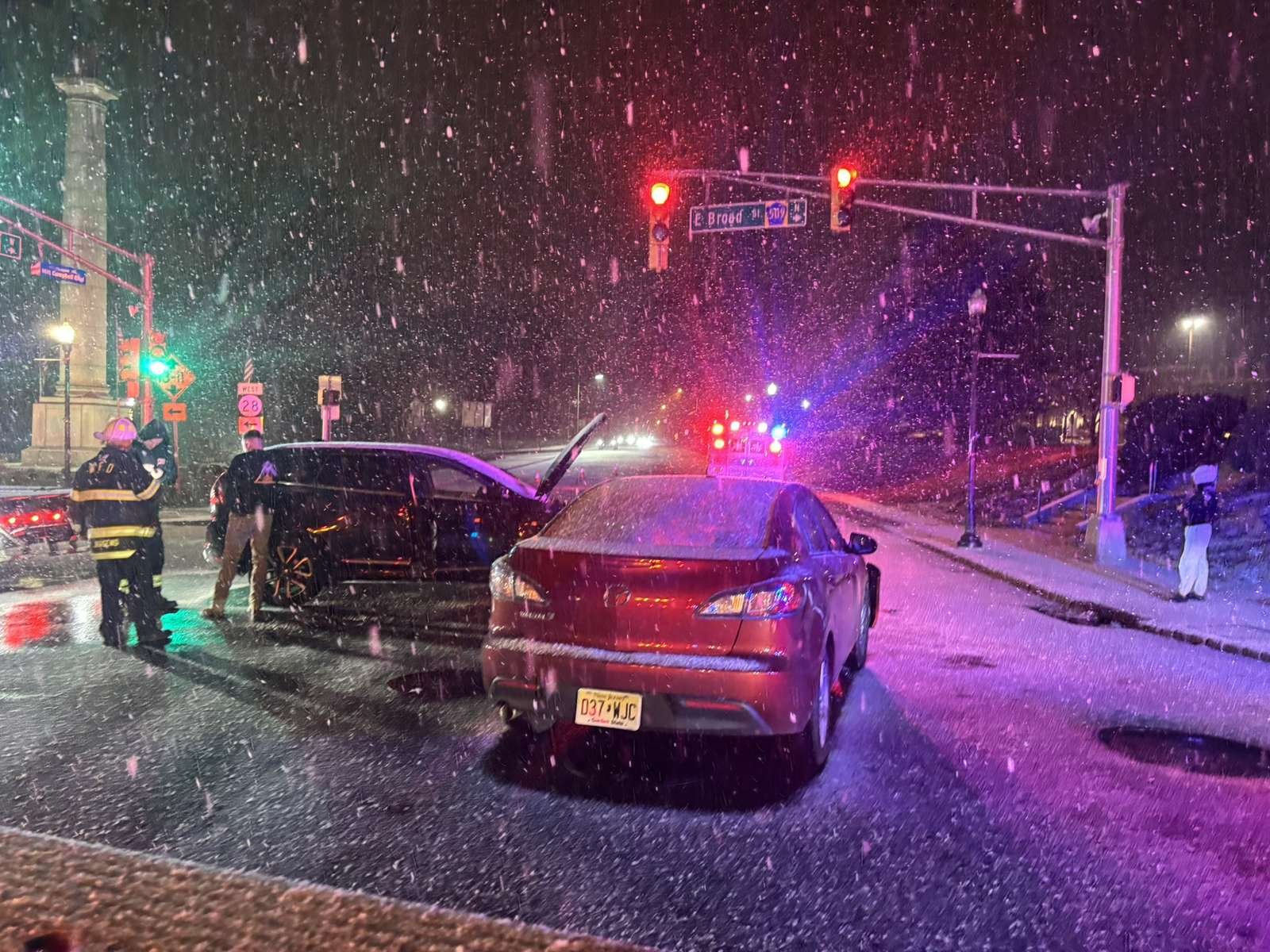Ariel’s Towing at a nighttime accident scene in the snow in NJ